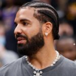 At a basketball game, Drake was spotted with cornrow braids, a rare hairstyle he has sported only a couple of times
