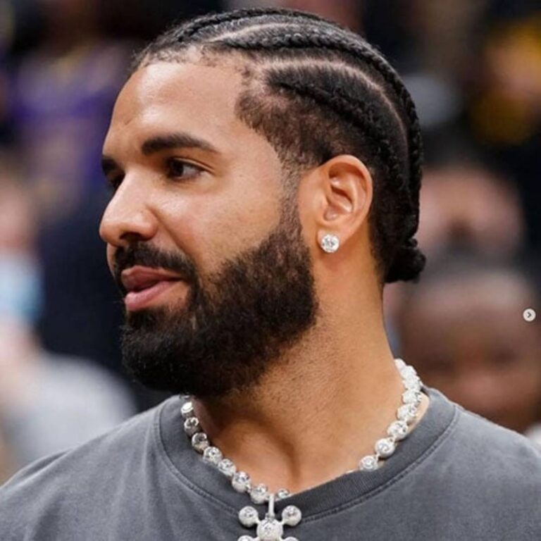 At a basketball game, Drake was spotted with cornrow braids, a rare hairstyle he has sported only a couple of times