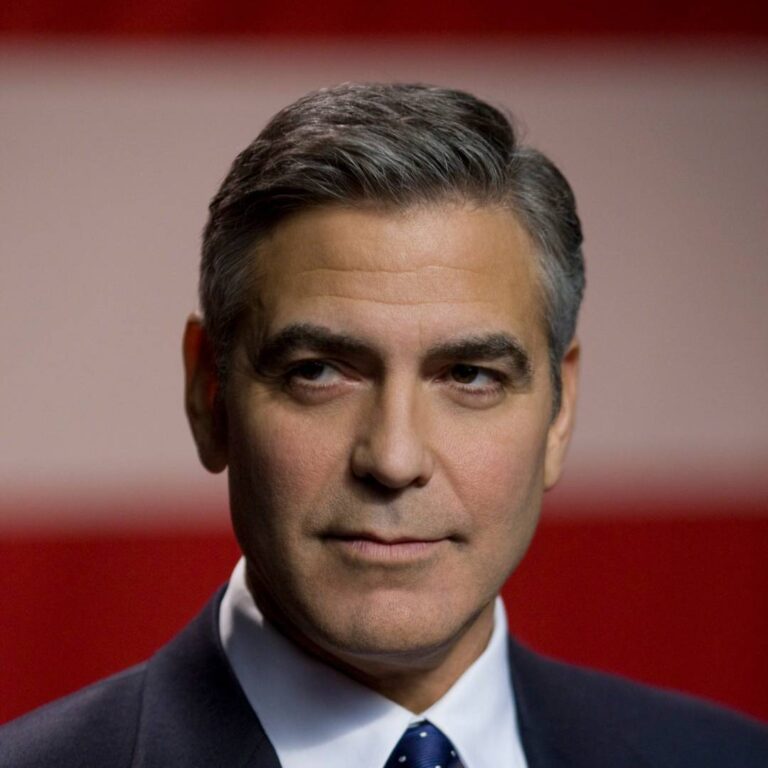 George Clooney is staring at something in a scene for The Ides of March.