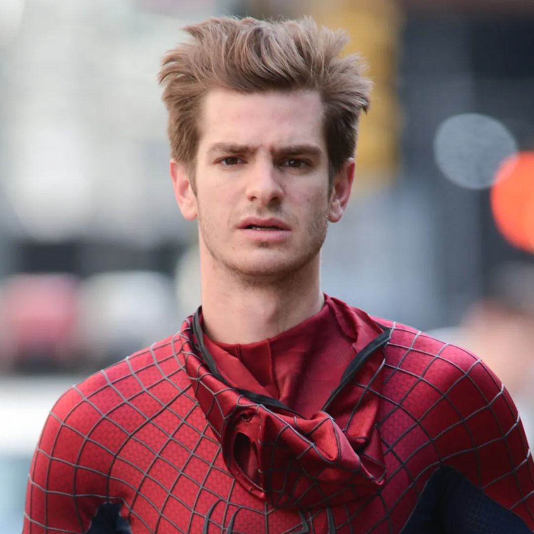 Andrew Garfield swings into action on the set of The Amazing Spider-Man, donning the iconic Spider-Man suit and showcasing his effortlessly cool quiff hairstyle that adds an extra dose of superhero swagger.