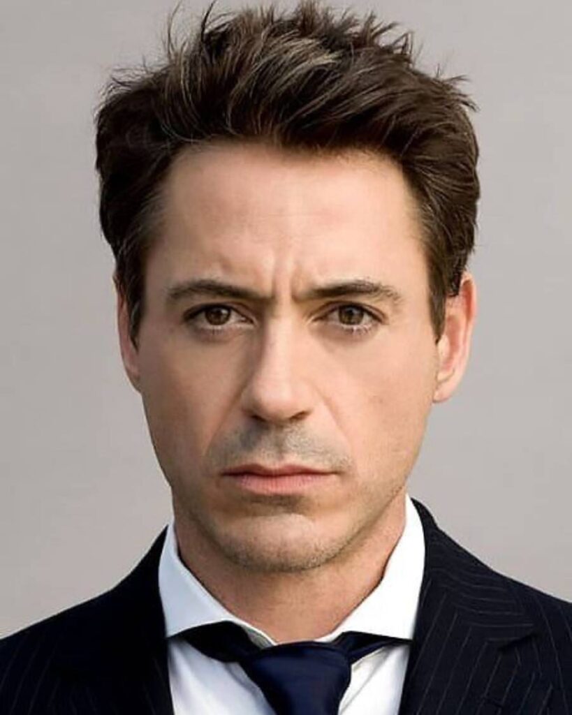 Robert Downey Jr. holds the second position in the best actors of all time, highlighted by his signature haircut and style.